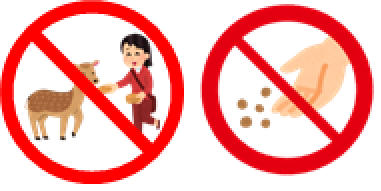 赤い斜線が入った二つの禁止マークで構成されたピクトグラムで、左は女性が子鹿に餌やりをしている姿、右は手が餌をまいている様子のイラスト